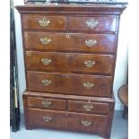 A 19thC mahogany chest-on-chest, comprising an arrangement of eight drawers with cast brass bail