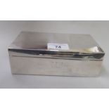A silver cigarette box with a hinged lid  Birmingham 1932  7"w
