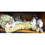 20thC toys: to include an Abberon porcelain doll, in a relaxed pose  7"h  14"L; and a mohair Teddy