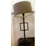 A modern spot-hammered metal table lamp  18"h