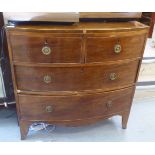 A 19thC string inlaid and crossbanded mahogany four drawer, bow front dressing chest, raised on