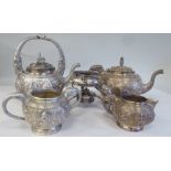 An Anglo-Indian four piece white metal tea set of bulbous form with elephants head and trunk