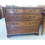 A 19thC mahogany dressing chest with a foldover top, on twin loppers, over two short drawers/three