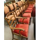 A set of eight 19thC style mahogany framed ladderback dining chairs with upholstered drop-in