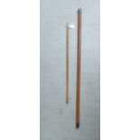 A swagger stick with an Army OTC cap terminal; and a malacca walking cane, the spot-hammered