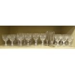 Drinking glasses: to include a set of twelve pedestal wines with hobnail cut decoration