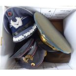 Six various foreign military and military style peaked caps (Please Note: this lot is subject to the