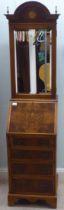 A modern lady's Queen Anne inspired yewwood finished and string inlaid walnut bureau, the upper part