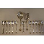 Sterling silver flatware: to include ten teaspoons with decoratively scrolled terminals; two