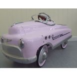 A painted model pedal car, Super Sport in pale pink livery with rubber wheels  40"L overall