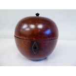 A 19thC turned treen tea caddy in the form of an apple with a lockable, hinged lid  5.25"h