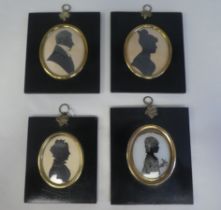 Four similar 19thC oval profile head and shoulders portrait miniature silhouettes, each in a