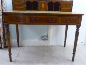 A modern Victorian style mahogany satinwood inlaid bonheur du' jour, the superstructure with drawers