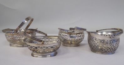 Four similar 19thC Continental silver coloured metal miniature sweet baskets with variously