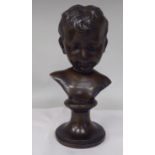 A late 19thC cast and patinated bronze bust, a young boy, on a turned socle  11.5"h