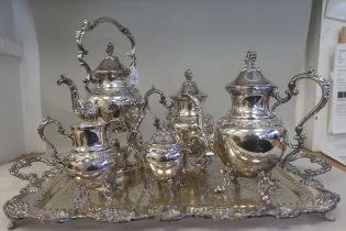A vintage 19thC style B & Co silver plate on copper five piece tea/coffee set of bulbous form with