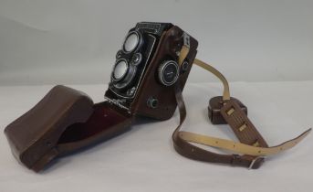 A Franke & Heidecke Rolleiflex camera, in a stitched and moulded brown hide case