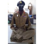 Two vintage British Army battledress tunics, one with emblems and an associated beret (Please