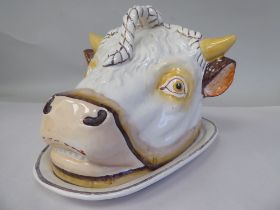 A Staffordshire pottery 'cows head' cheese dish and cover  9"h