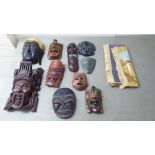 20thC Asian tourist collectables, mainly wooden masks  largest 11"h