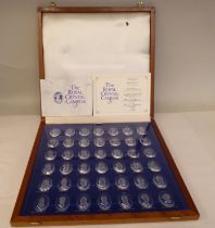 A set of forty-two Danbury Mint sculpted crystal cameos, depicting head and shoulders portraits of