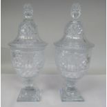 A pair of hobnail cut and slice decorated, pedestal vase design glass sweet jars with domed covers