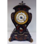 A late 19thC French black lacquered and boulleworked oak cased balloon shape mantel timepiece with