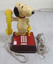 A novelty plastic landline telephone 'Snoopy'  12"h