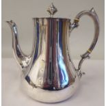 A mid Victorian silver pear shape coffee pot, double C-scrolled handle and a flush fitting hinged