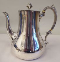 A mid Victorian silver pear shape coffee pot, double C-scrolled handle and a flush fitting hinged