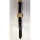 An Omega gold plated and stainless steel cased wristwatch, the square baton dial, on a black hide