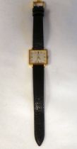 An Omega gold plated and stainless steel cased wristwatch, the square baton dial, on a black hide