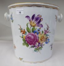 A 19thC porcelain pail with opposing knob handles, decorated with mixed floral sprigs and gilding