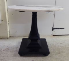 A modern pedestal table with a drop-in marble top  23.5"h  25"dia