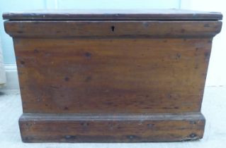 An early 20thC pine chest with a hinged lid  18"h  25"w