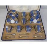 A 1930s set of six Royal Doulton china octagonal shaped coffee cups and saucers with sponged blue