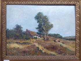 Early 20thC British School - a cottage at the foot of a wood  oil on board  14" x 19"  framed