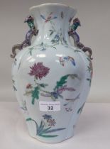 A 20thC Chinese porcelain vase of flattened and panelled baluster form, incorporating opposing,