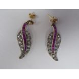 A pair of bi-coloured metal leaf design earrings, set with coloured stones