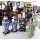 Five 19th and 20thC Oriental porcelain table lamps, each decorated in unique taste  tallest 16"h