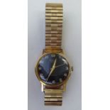 A 1970s Rodania Flytester rolled gold cased bracelet watch, faced by an Arabic dial