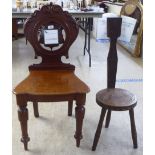 A mid Victorian mahogany hall chair; and an Arts & Crafts oak spinning chair