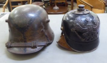 Military related items: to include a German Great War helmet  (Please Note: this lot is subject to