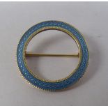 A 14ct gold circular enamel pin brooch