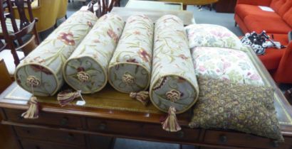 Scatter cushions: to include a bolster type, decorated with flora