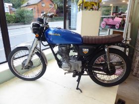 A 1977 Honda CG 125 motorcycle, Historic Vehicle, 124cc petrol engine with blue livery (Vin