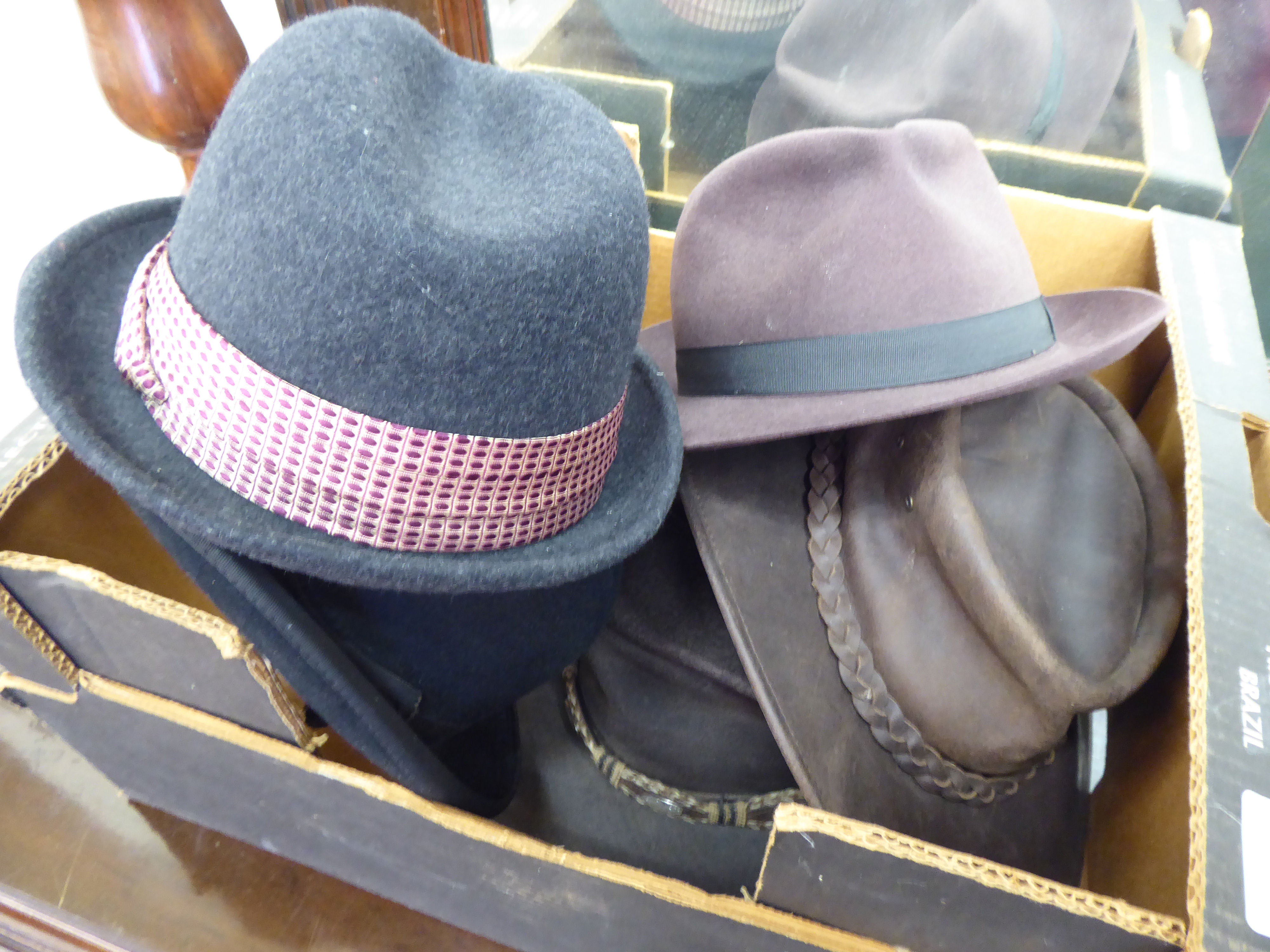 A selection of felt, hide and other hats