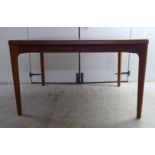 A circa 1970s teak draw leaf dining table by Henning Kjærnulf for Vejle Stole Mobelfabrik of