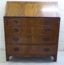 A late 19thC string and ebony inlaid mahogany bureau with a fall flap, over four graduated