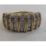 A 9ct gold wide band, set with seven columns of diamonds  boxed